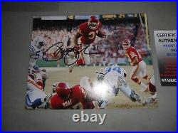 Kansas City Chiefs PRIEST HOLMES signed 8 x 10 photo LEAPING OVER THE PILE COA