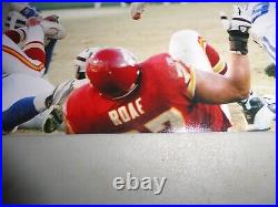 Kansas City Chiefs PRIEST HOLMES signed 8 x 10 photo LEAPING OVER THE PILE COA Kansas City Chiefs PRIEST HOLMES signed 8 x 10 photo LEAPING OVER THE PILE COA