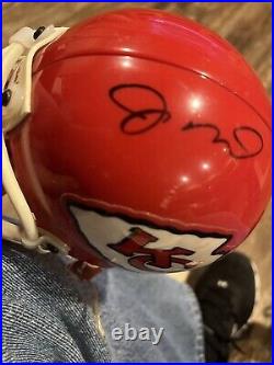 Kansas City Chiefs mini helmut signed by Joe Montana withAuthenticated Card